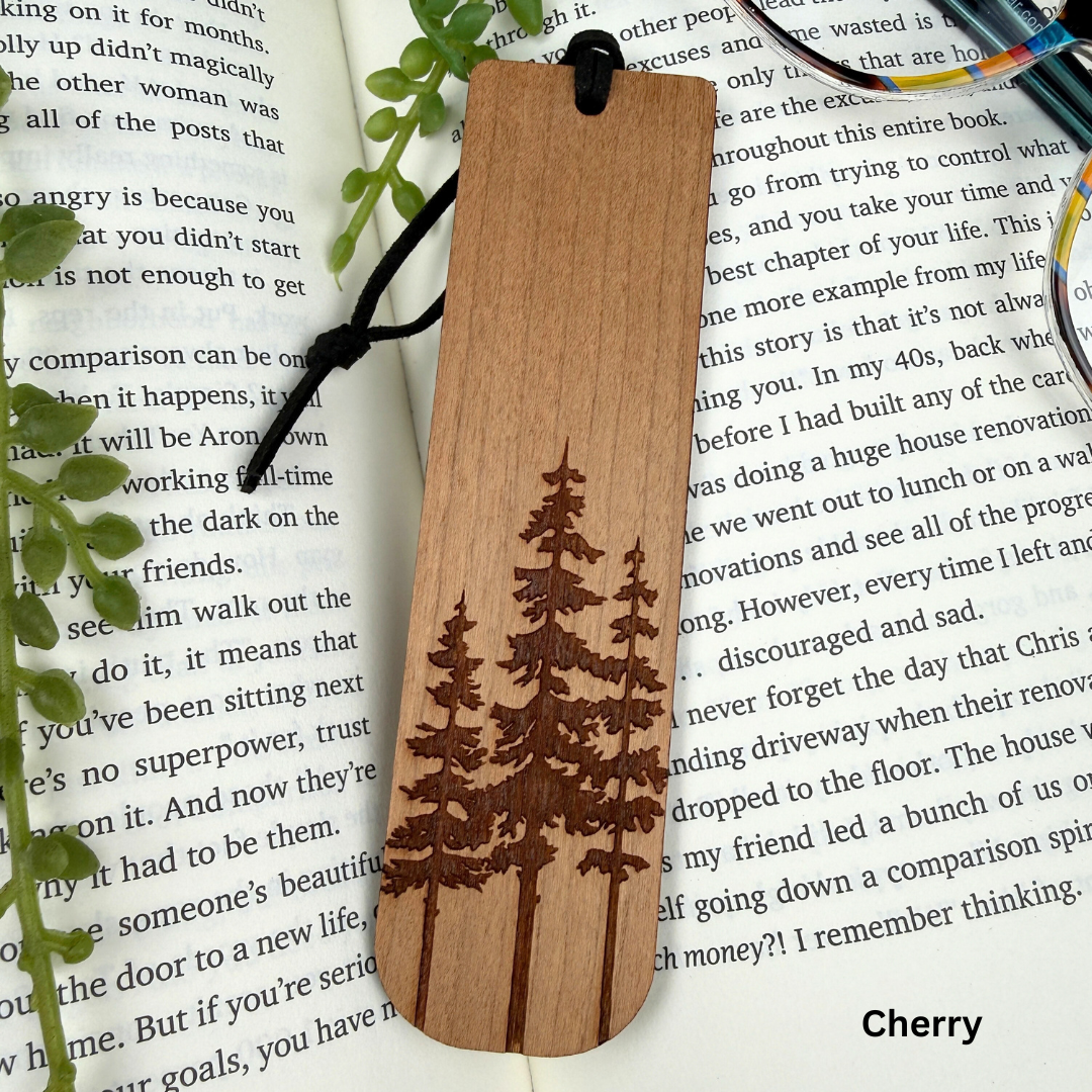 Wooden bookmark with tree design on a book page
