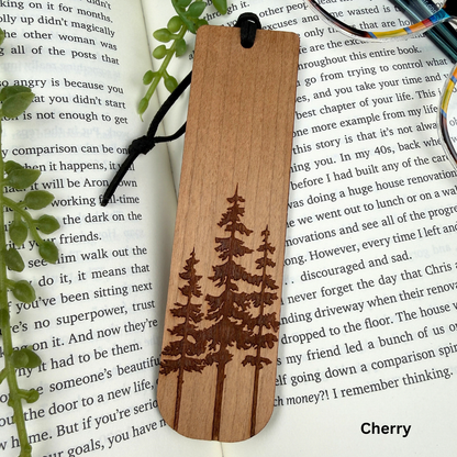 Wooden bookmark with tree design on a book page
