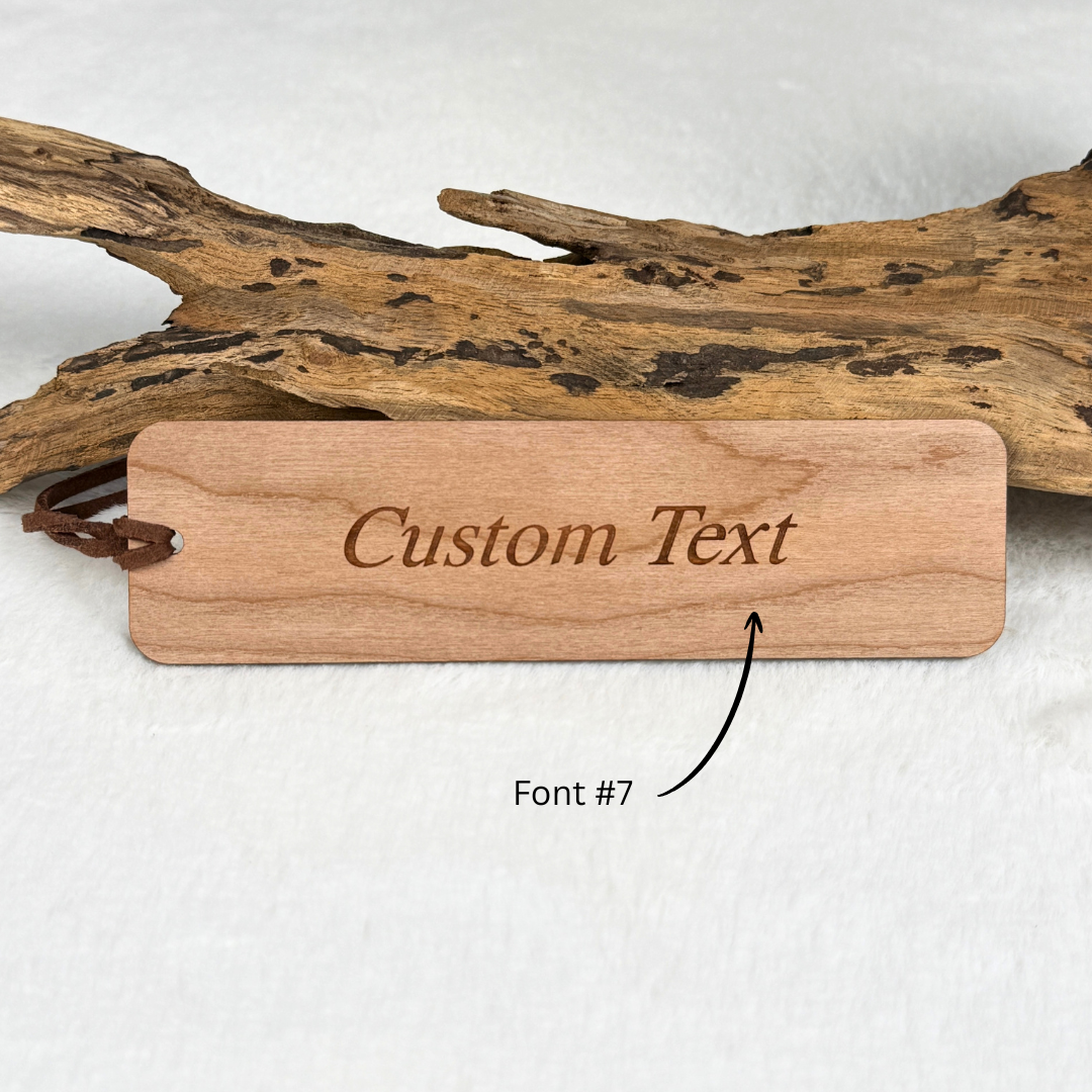 Walnut and cherry wooden compass bookmarks with engraved appreciation quote and optional personalized back.