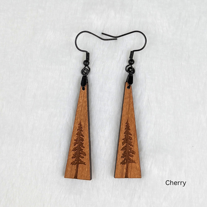 Wooden earrings with an engraved tree design made from cherry wood and finished with vegan wood oil. Triangle shape with black stainless steel hooks.