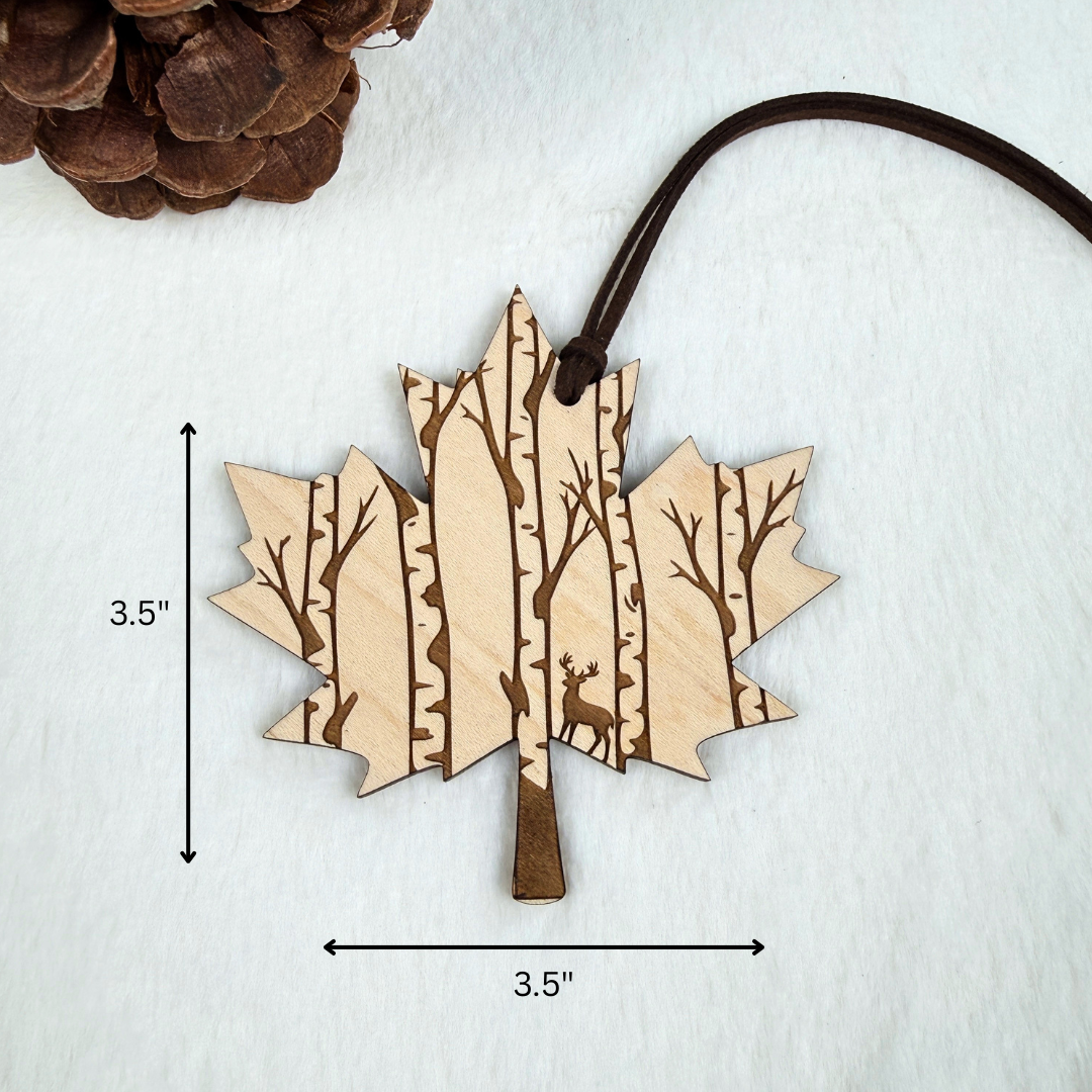 Maple wood Canadian maple leaf ornament with engraved deer and birch forest showing the measurements.