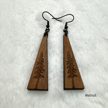 Wooden earrings with an engraved tree design made from walnut wood and finished with vegan wood oil. Triangle shape with black stainless steel hooks.