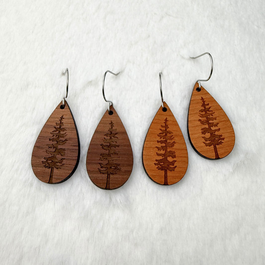 Wooden earrings with an engraved tree design from walnut or cherry wood. Finished with vegan wood oil and stainless steel hooks. 